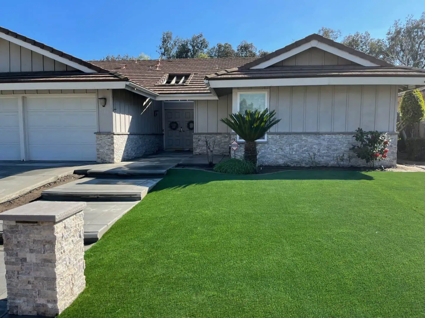 A house with a yard that has been trimmed.