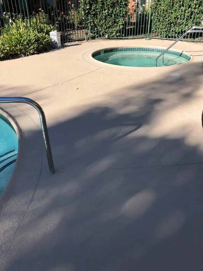 A pool with two pools in it and one is empty.