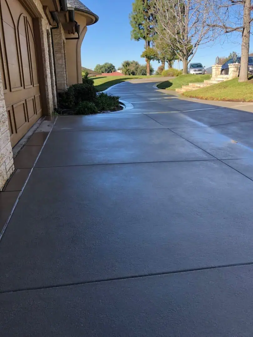 A sidewalk with no one on it is shown.