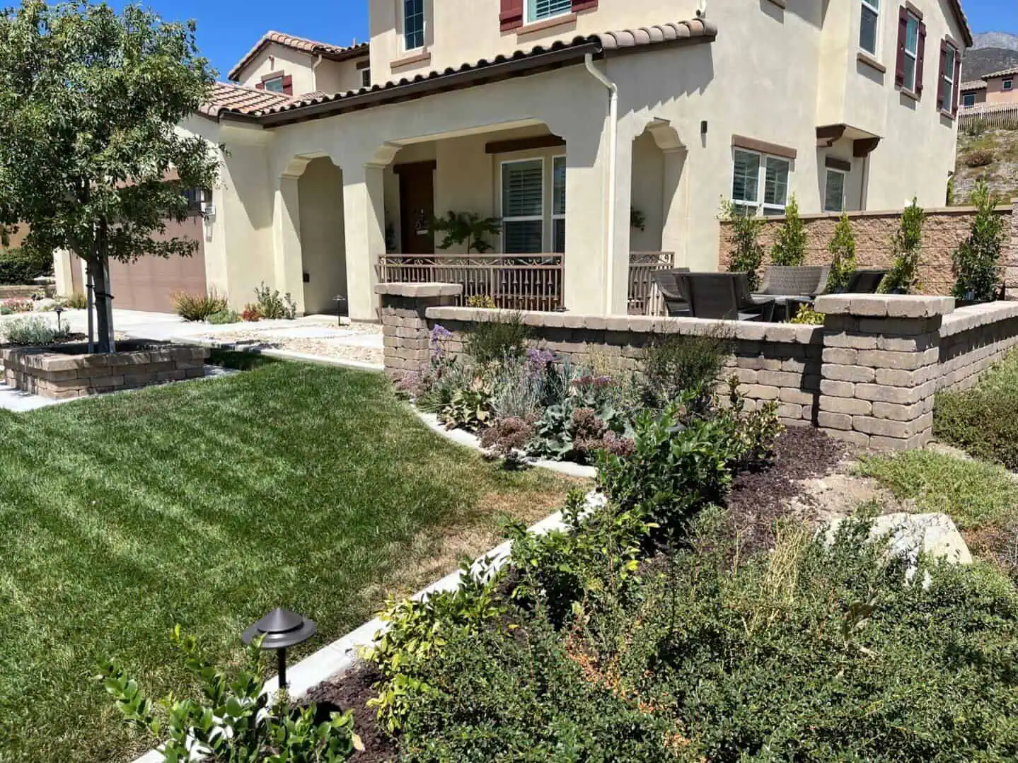 A house with a garden in the front yard