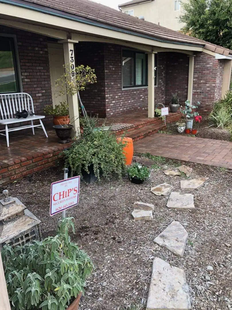 A house with a sign that says " sold ".