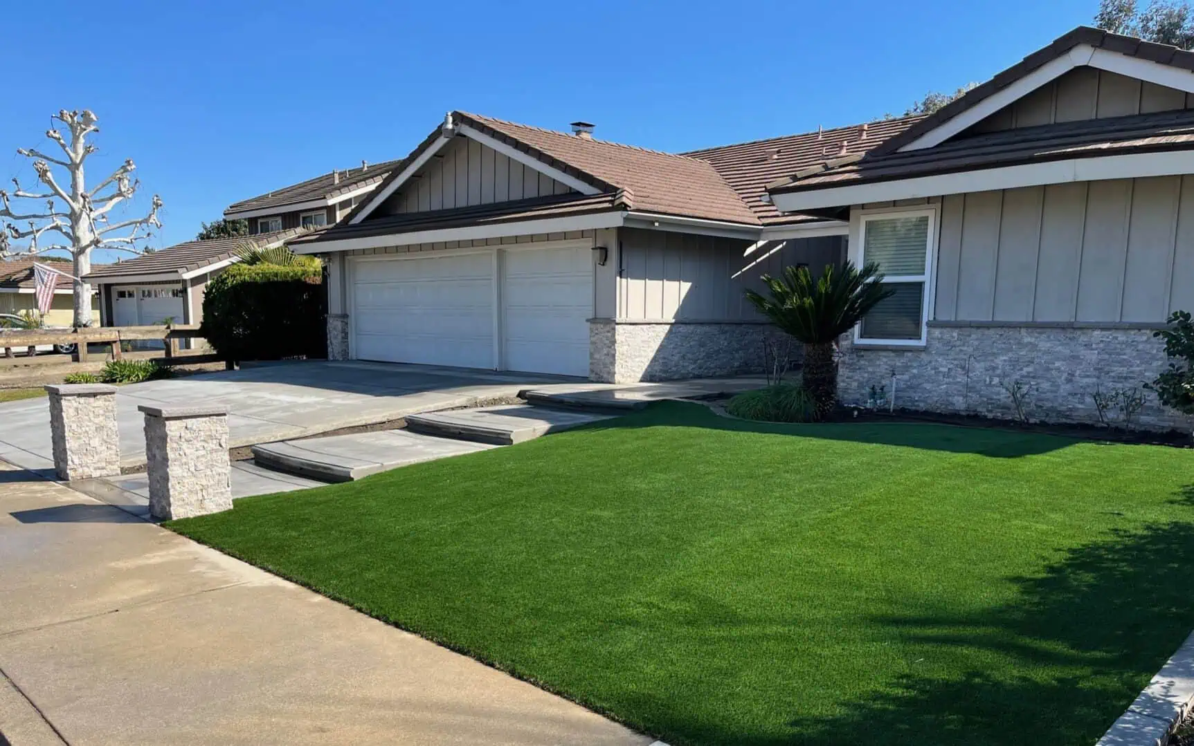 A house with a lawn in front of it